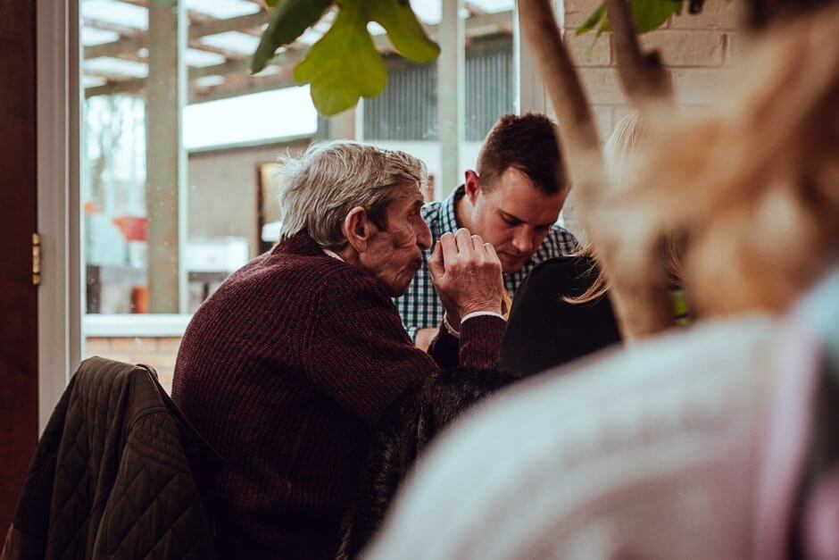 man talking with son about girlfriend's past