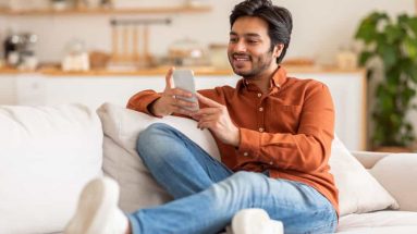 man looking at phone